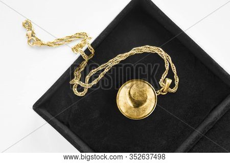 Vintage Gold Locket Pendant On Gold Chain In Black Jewel Box Closeup