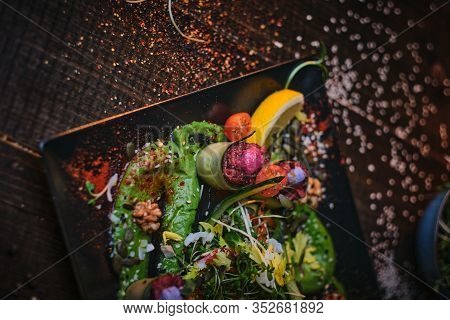 Raw Appetizer Of Grilled And Oven Baked Cucumber Rolls Served With Vegan Spread, Thin Sliced Vegetab