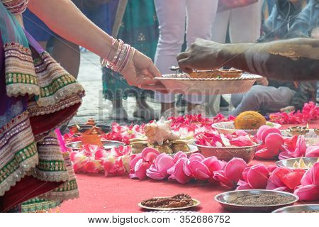 Wedding Ceremony, Traditional Indian Hindu Marriage Ritual With Red Flowers And Attributes