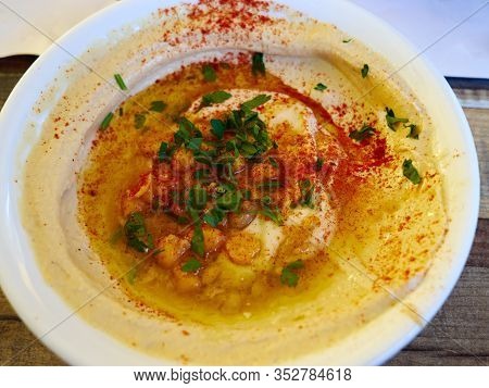 Dish Of Fresh Hummus With Olive Oil And Parsley Middle East Arabic Food