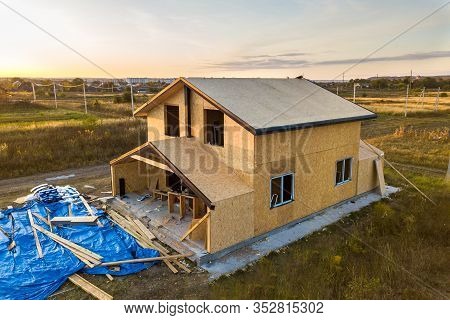 Construction Of New And Modern Modular House. Walls Made From Composite Wooden Sip Panels With Styro
