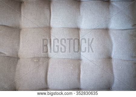 White Quilted Headboard Seamless Pattern. Close Up