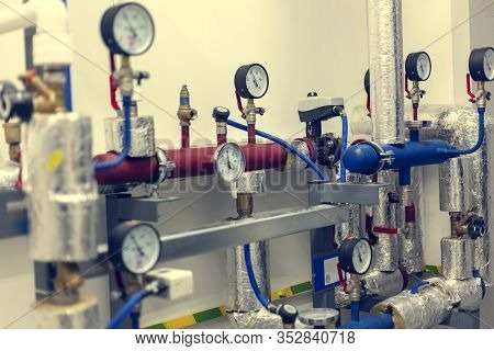 Heating Unit, Pump, Pressure Gauge, Pipes And Valves Of The Heating System, Toned
