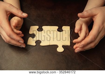 Collecting Pazzles, Building Future. Close Up Shot Of Female And Kids Hands Doing Different Things T
