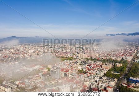 Puli, Nantou - Jan 2nd, 2020: aerial view of Puli cityscape with clouds over the city, Nantou county, Taiwan