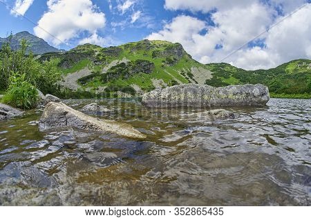 Lake Rohacske Plesa, West High Tatras Mountains, Slovakia In Summer