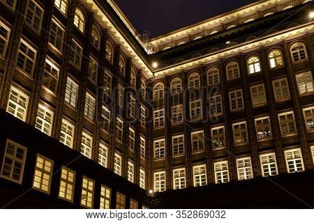 Hamburg, Germany. The Chile House (german: Chilehaus ), Inner Courtyard, In The Evening. Located In 