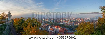 Colorful Autumn Colors, Bright Blue Sky In The Park And Eggenberg Palace In Graz, Styria Region, Aus