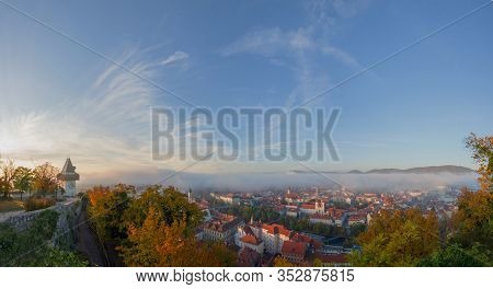 Colorful Autumn Colors, Bright Blue Sky In The Park And Eggenberg Palace In Graz, Styria Region, Aus