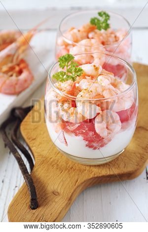 Two Verrines For Appetizer. Shrimp With Grapefruit And Cream On Ligth Background