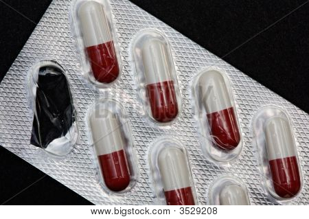 Pills In Plastic Container