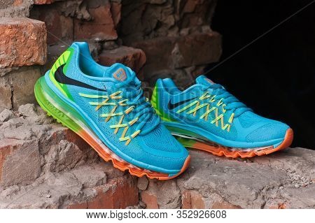 Nike Flyknit Air Max Running Shoes, Sneakers, Trainers Close Up View, Shot Outdoors On Ruined Brick 