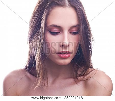 Make up beauty. Portrait of a young beautiful girl isolated on white background