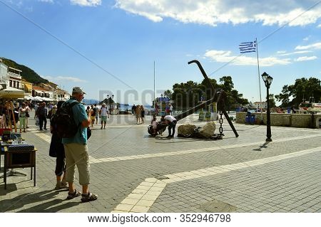 Paxos Harbour, Greece - October 01, 2017 : Tourist Visiting Paxos Harbour A Small Island South Of Co