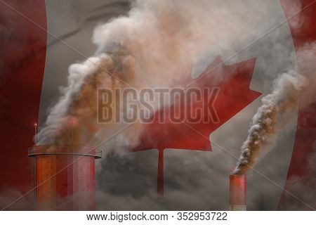 Global Warming Concept - Dense Smoke From Plant Chimneys On Canada Flag Background With Place For Yo