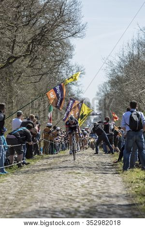Wallers,france - April 12,2015: The Breakaway Approaching Through A Crowd Of Excited Spectators Duri