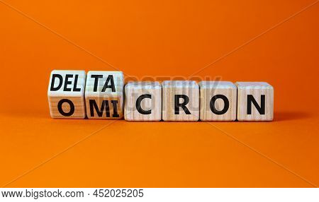 Covid-19 Omicron Or Deltacron Symbol. Turned Cubes And Changed The Concept Word Omicron To Deltacron