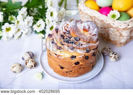 Craffin (cruffin) With Raisins And Candied Fruits. Easter Bread Kulich And Painted Eggs. Easter Holi