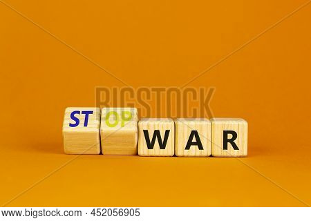 Stop War Symbol. Turned Cubes And Changed Concept Words War To Stop War. Beautiful Orange Table Oran