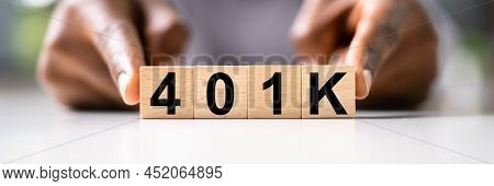 African American Man With 401k Blocks. Income Money Investment