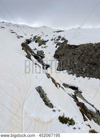 Snowy Landscape With Snow Tinged With Desert Sand, Calima, Snow Soiled With Sand From A Sandstorm, V