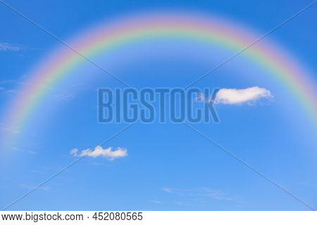 Rainbow On The Summer Sky . Natural Phenomenon In The Sky