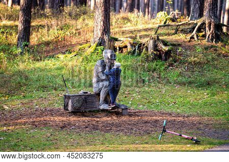 Riga, Latvia, October 30, 2021: Punk Sitting On A Radio, Sculpture By Lithuanian Sculptor Tautvils P