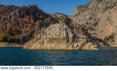 Stone Cliffs At Oymapinar Dam In Green Canyon In Turkey