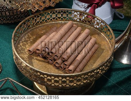 Chocolate Wafer Stick Roll, Wafer Stick Crunchy In The Plate, Delicious, Sweet, Snack. Chocolate Tub