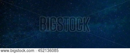 Tellar Milky Way At Night With Stars. Panorama Of The Dark Blue Starry Sky