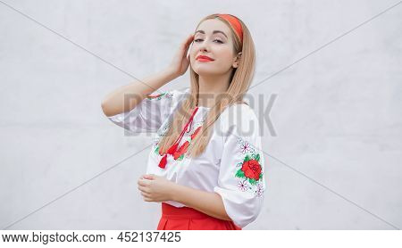 European Folk Fashionable Woman In Embroidery Traditional Shirt. Concept Of National Costume