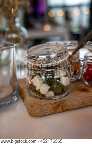 Glass Jars With Healthy Party Snacks Served In Bar, Tasty Appetisers
