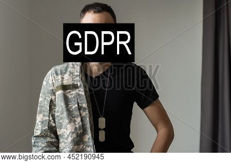 Gdpr - General Data Protection Regulations Military Concept. Soldier Offers A Padlock With Gdpr Word