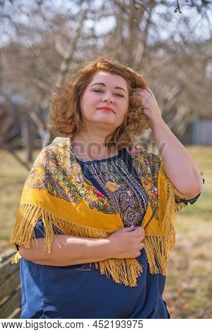 European Plus Size Ethnic Woman In Embroidery Traditional Shirt And Scarf. Concept Of National Costu
