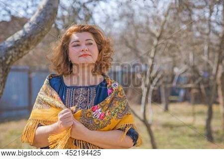 European Plus Size Ethnic Woman In Embroidery Traditional Shirt And Scarf. Concept Of National Costu