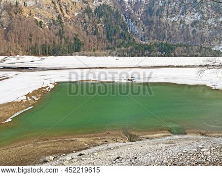 Thawing A Frozen Lake Klöntalersee Or Klontaler Lake During Early Spring In The Alpine Valley Klönta