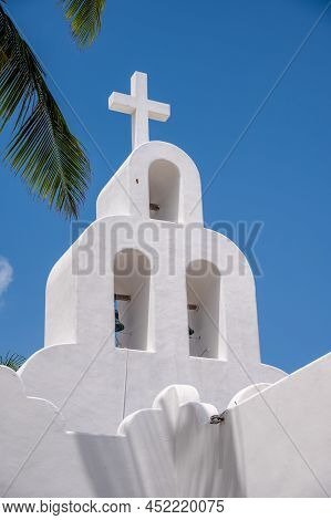Steeple Of The Capilla De Nta Señora Del Carmen On 5th Avenue In Playa Del Carmen.
