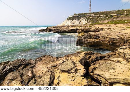  Picturesque limestone mountain Rosh - ha - Nikra. Israel's northern border with Lebanon. Storm on the Mediterranean