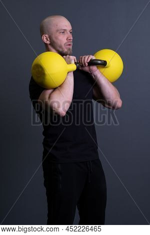Guy With A Yellow Kettlebell Gym Anonymous Yellow Male, In The Afternoon Sporty Effort In Strong For