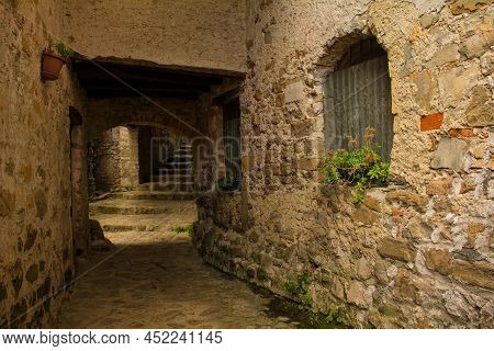 An Alley In Poffabro, An Historic Medieval Village In The Val Colvera Valley In Pordenone Province, 