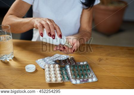 Senior Woman Take Daily Vitamins, Beauty Supplements