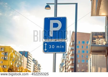 Road Sign Allowing Parking For 30 Minutes In A Developing City Area In Copenhagen, Denmark