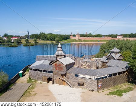 Russia, Veliky Novgorod, 2021 June 04: Wooden Building In Ethnic Style Of Sadko Street Theater On A 