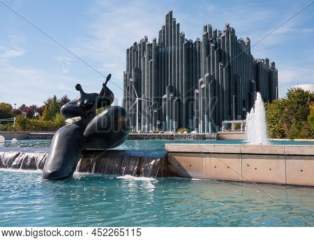 Poitiers, France - September 21 2010 : Dynamic Flying Theatre attraction at Futuroscope and sculptures from Jean-Louis Toutain