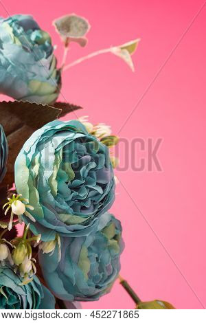 Blue Peonia Artificial Flowers On A Pastel Pink Background. Spring Minimal Backdrop.
