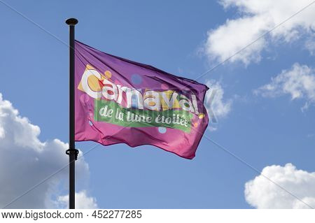 Landerneau, France - April 03 2022: Flag Of The Carnaval De La Lune Etoilée.