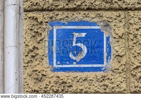 Blue Plaque Number Five Chiped Damaged Rough Wall