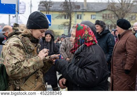 Russian-ukrainian War. Humanitarian Aid In Bucha