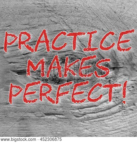 Motivational Quote. Practice Makes Perfect. Selective Focus.
