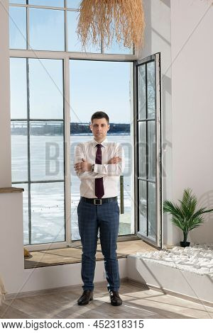 Portrait Of A Male Freelancer. Decentralized Work Of Digital Nomads, Hybrid Work Model.